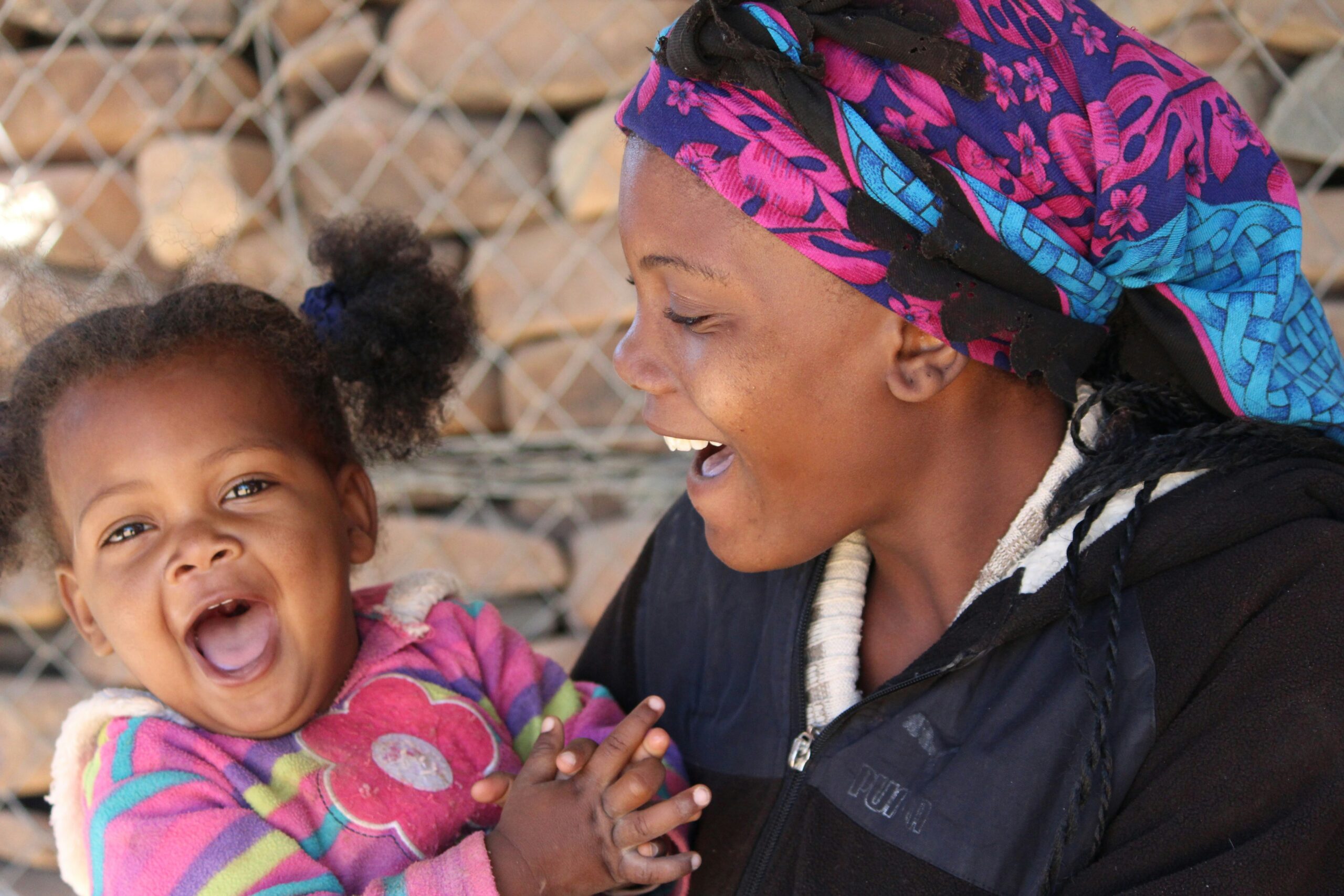 mother and child laughing together